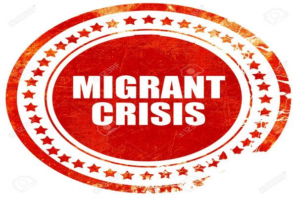 55279835 migrant crisis isolated red stamp on a solid white background