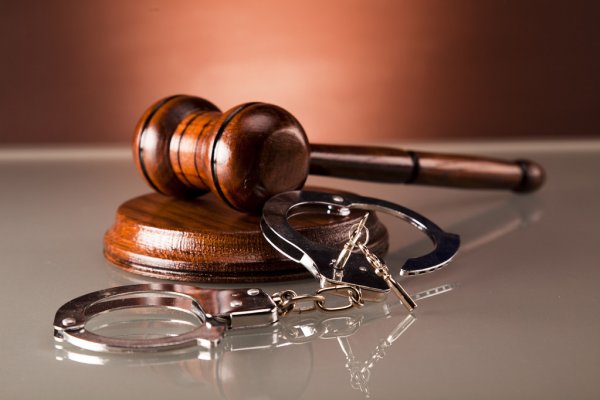 depositphotos 41278535 stock photo law gavel and handcuffs a