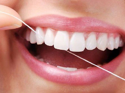 Третя причина появи зубної нитки