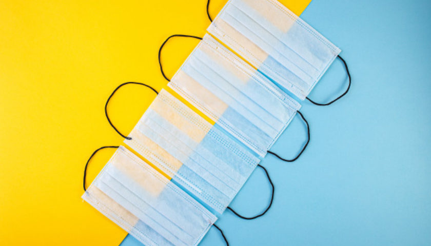 medical mask medical protective masks on blue and yellow background prevent coronavirus 113725 2365 840x480 c 1