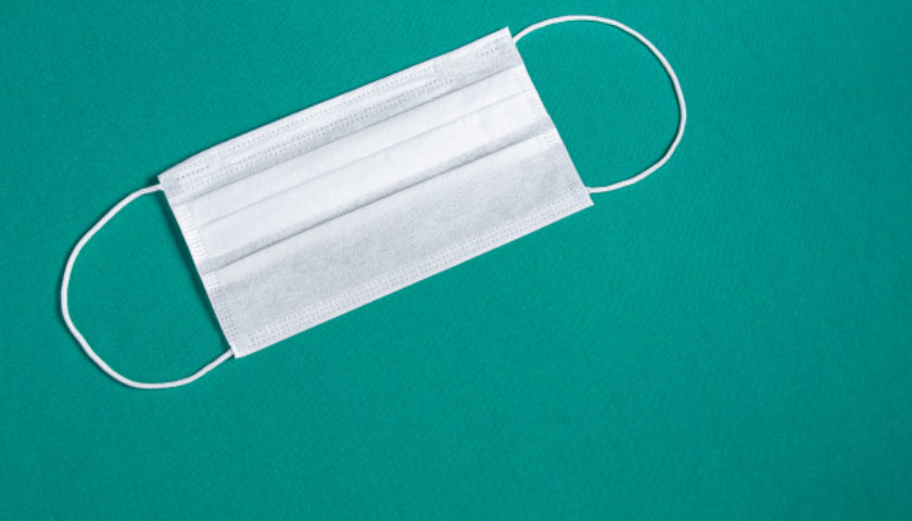 surgical mask minimalist green background 58702 783 840x480 c 1