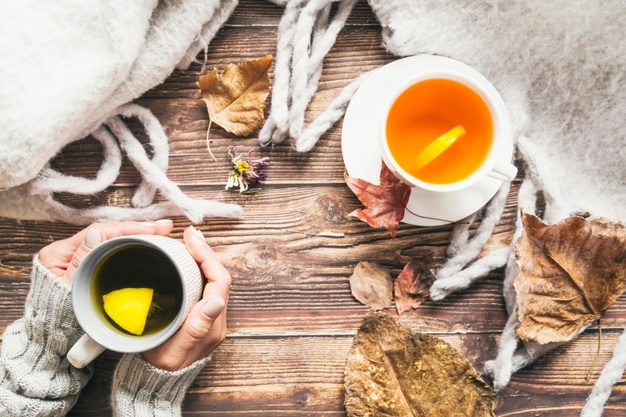 composition with autumn tea and coffee on table 23 2148206024