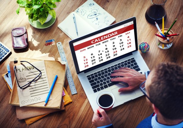 depositphotos 60118753 stock photo man looking at calendar on