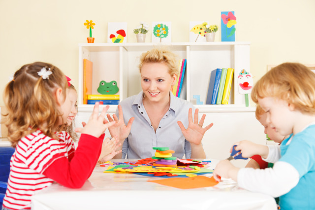 ABA therapist with children