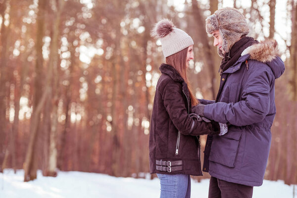 depositphotos 243938580 stock photo young couple walking forest winter