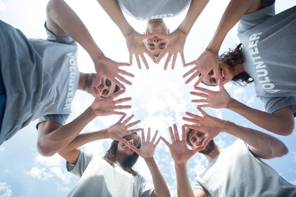 depositphotos 76632667 stock photo happy volunteers playing with their
